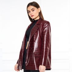 A burgundy, patterned leather jacket sounds like a standout piece! The rich, deep color adds a touch of sophistication, while the patterns can give it a unique and trendy edge. This combination makes it a versatile jacket that can elevate both casual and more dressed-up outfits. Whether you pair it with jeans and a t-shirt for a cool, everyday look or with a chic dress for a night out, it’s sure to make a statement. 30% Polyurethane 70% Polyester Fall Burgundy Business Blazer, Burgundy Outerwear For Business In Fall, Burgundy Business Outerwear For Fall, Luxury Burgundy Outerwear For Fall, Burgundy Leather Jacket For Work, Chic Burgundy Leather Jacket For Winter, Chic Burgundy Leather Jacket, Burgundy Leather Jacket, Versatile Jacket