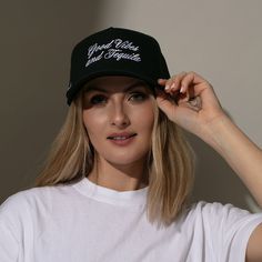 Nothing compares to good vibes and tequila. Coming in all black and a two-tone charcoal and tan colorway, our Tequila Vibes Trucker Hat is just the thing your effortless cool girl look needs. Not only does this canvas snapback hat have “Good Vibes and Tequila” embroidered on the front, but it also has an added side embroidery reading “Uncommon James established 2017.” Short Brim Streetwear Baseball Cap, Trendy Black Flat Bill Trucker Hat, Trendy Black Trucker Hat, Curved Bill Snapback Hat For Streetwear, Trendy Black Trucker Hat For Everyday, Casual Black Trucker Hat, Casual Black Trucker Hat For Everyday, Black Trucker Hat With Letter Print For Everyday, Uncommon James