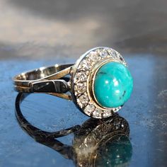 When ordering, please give us your phone number for safer Fedex shipping!Ring Size: US 6 3/4 EU 54 (FREE RESIZING) Metals Type: Hallmarked 18K White Gold Weight: 4.50 grams Total diamond weight 0.32 ct. Cut: single cut Color/Clarity: H/Si Natural turquoise Condition: Excellent This 1920s Art Deco Vintage Antique Diamond and Turquoise Solid 18k Hallmarked White Gold Engagement Multi Stone Ring is a stunning piece of jewelry that is sure to turn heads. The ring features a beautiful combination of diamonds and turquoise stones, set in a solid 18k white gold band that is hallmarked for authenticity. The intricate design and impeccable craftsmanship reflect the opulence of the Art Deco era, making this ring not just jewelry but a piece of history. Its timeless allure is accentuated by the mesme Luxury Turquoise Anniversary Ring, Elegant Hallmarked Turquoise Ring For Anniversary, Formal Hallmarked Turquoise Ring, Elegant Turquoise Ring With Bezel Setting For Anniversary, Antique Turquoise Anniversary Ring, Antique Hallmarked Turquoise Ring, Turquoise Jewelry With Center Stone, Classic Hallmarked Turquoise Ring For Anniversary, Hallmarked Turquoise Ring Fine Jewelry