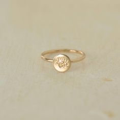 Embrace timeless elegance with our Birth Flower Ring, where traditional charm meets personalized flair. Crafted in 14k gold filled, this meaningful piece can be tailored with a hand-stamped birth flower. Carry a token of cherished memories with you wherever you wander, securely encircling your finger. Handcrafted in the U.S.A Details Hypoallergenic, Water Resistant, Tarnish-free Material : 14k Gold Filled Flower Stamp 4mm Note: If your size is a half ex: 5 1/2, leave us a note at the cart reques 14k Gold Birth Flower Promise Ring, 14k Rose Gold Flower Ring With Birth Flower, 14k Gold Flower Shaped Rose Gold Jewelry, 14k Rose Gold Flower-shaped Jewelry, 14k Rose Gold Flower Jewelry, Rose Gold Flower-shaped 14k Gold Jewelry, Rose Gold 14k Flower Shaped Jewelry, Dainty 14k Gold Flower Ring With Birthstone, 14k Gold Birth Flower Rings