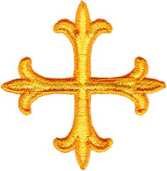 an embroidered gold cross on a white background