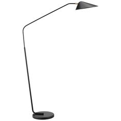 a black floor lamp on a white background with the light turned on and dimming