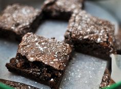 some brownies are on a plate with a spoon