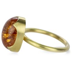 Get your daily dose of orange citrus in this 18k yellow gold ring from Gabriella Kiss. An oval Imperial topaz cabochon is lovingly set in the artist’s signature scalloped bezel for some extra designer flair. Stone measures 7/16" x 9/16”. Round band measures 2.1mm wide. Size 7. Handcrafted in Hudson Valley, NY, U.S. Imperial Topaz Ring, Anthony Lent, Gabriella Kiss, Hudson Valley Ny, Orange Citrus, Gold Topaz, Imperial Topaz, Wax Casting, Cabochon Ring