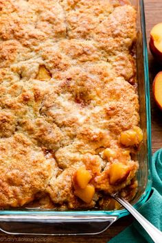 a casserole dish with peaches on the side