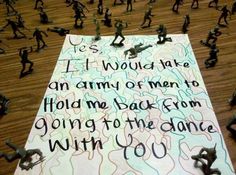 a group of small figurines are scattered around a sign that reads, it would take an army of men to hold me back from going to the dance with you