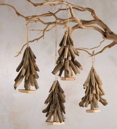 driftwood christmas tree ornaments hanging from branches