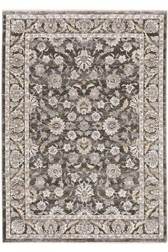 a gray and white rug with an ornate design on the bottom, surrounded by flowers