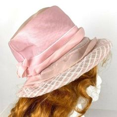 So sweet and delicate! A vintage 1950's church hat. Great condition considering age. A small spot on the top of the brim. Has a pink accent bow. Should fit most sizes. Slight stretch. About 8" across inside and 13" end to end. Please contact me with questions! Retro Pink Wide Brim Hat, Retro Pink Brimmed Hat, Vintage Brimmed Hats For Vintage Fashion, Vintage Brimmed Hat, Vintage Adjustable Bucket Hat, Vintage Adjustable Mini Bucket Hat, Vintage Short Brim Hat For Vintage Events, Vintage Style Short Brim Hat For Kentucky Derby, Retro Spring Cloche Hat