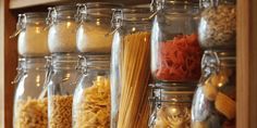 several jars filled with different types of food