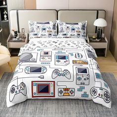 a bed with a video game themed comforter