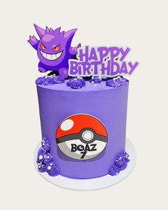 a birthday cake with purple frosting and an image of a pokemon ball on top