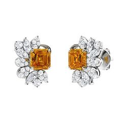 Showcasing sparkling emerald cut Citrine in 14k White Gold in the center in this semi flower design. Shimmering marquise cut diamond reflect as petals with dainty round diamonds at the top and bottom. Look effortlessly dazzling and captivating with these gorgeous stud earrings. Citrine Drop Earrings, Marquise Cut Diamond, Marquise Cut