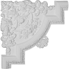 an ornate white wall panel with floral designs on the top and bottom, against a white background