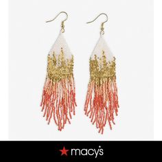 two pairs of earrings with beads and fringes on them, one in gold and the other in red