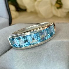 Accepting All Reasonable Offers! Save Money On Bundles Of 2 Or More Items! Free Gift With Any Bundle Purchase! Vintage Princess Cut Blue Topaz Raised Band Ring. It’s About 6mm Wide With 5 Genuine Blue Topaz Gemstone Channel Set. Size Is About 8. The Color Is So Beautiful Like Staring Into A Blue Ocean! December’s Birthstone! Perfect Gift! Comes In A Gift Box Or Velvet Pouch! A Beautiful Addition To Your Fine Jewelry Collection! *Please See All Photos For Style, Size, & Full Condition! All Jewelry Is Cleaned & Polished Before Shipping! Trusted 5 Star Seller! Buy With Confidence! Fast & Secure Shipping! Posh Ambassad Vintage Princess, 18k Gold Jewelry, Fine Jewelry Collection, Topaz Gemstone, Princess Cut, 925 Sterling Silver Jewelry, Estate Jewelry, Womens Jewelry Rings, Statement Jewelry