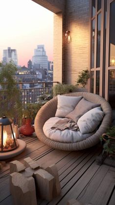 an outdoor seating area with fire pit and potted plants on the deck at dusk