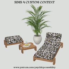 the chair and ottoman is next to a potted palm tree in front of it