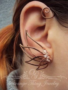 image 0 Elf Earrings, Ear Wraps, Ear Peircings, Ear Crawler, Geode Earrings, Swan Song, Gold Armband, Simple Bracelets, Ear Cuffs