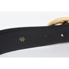 This 1980's Gucci black leather logo wide vintage belt is Italian and has the large gold plated GG's. It says 100/40 on the inside back. The GG's measure 2.5" W x 2.5" H as they are intertwined. The black belt strap is 44" L or wide x 1.85" H or deep. With the GG's logo included the entire belt width is 46.25" W or long. Says Made in Italy by Gucci. There are 3 original belt holes. Gucci Black Belt Buckle For Formal Wear, Elegant Black Gucci Belt Buckles, Gucci Designer Belt Buckles For Business, Classic Black Gucci Belt Buckles, Gucci Black Belt Buckle For Formal Occasions, Luxury Gucci Belt Buckles, Black Gucci Belt Buckle For Formal Wear, Classic Gucci Belt For Business, Gucci Elegant Business Belt