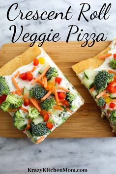 two slices of veggie pizza on a cutting board with the words crescent roll veggie pizza