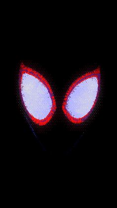 an image of the face of a spider man with red eyes and glowing blue eyes