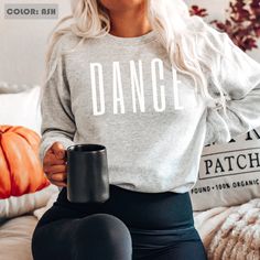 🎄 Items ordered by December 6th, are estimated to ship by December 14th. Barring any post office delays,  this gives enough time to have it by the 25th for those who live in the contiguous US.  This Dance Mom Sweatshirt -  Dance Mom Sweater, Crewneck Womens Unisex Pullover is everything you've ever dreamed of and more! Ideal gift for a Dance Mom, this heavy blend Sweatshirt is pure comfort.  Note: Please review the color and size charts when making your selection These garments are made from po Cold Sweatshirt, Bible Shirt, Phil Dunphy, Respiratory Therapy, Mom Sweater, Heart Sweatshirt, Christian Shirt, Yellow Stone, Throne Of Glass