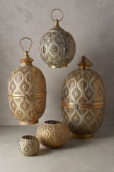 an assortment of decorative vases and containers