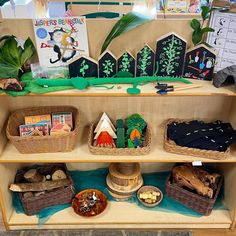 the shelves are filled with toys and books