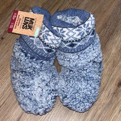 Brand New, Never Worn Blue Muk Luks! Size S/M (5-7) Slip Resistant Outsole Warm & Cozy Lining Comfortable Blue Slippers With Round Toe, Comfortable Blue Winter Slippers, Blue Round Toe Slippers, Blue Casual Outdoor Slippers, Blue Comfy Slippers With Round Toe, Comfy Blue Slippers With Round Toe, Comfy Blue Round Toe Slippers, Blue Synthetic Outdoor Slippers, Blue Non-slip Casual Slippers