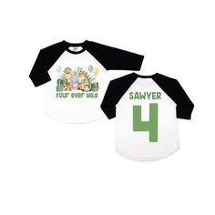 two white and black shirts with the number one printed on them, both in green