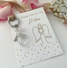 A beautiful handmade beaded sparkly crystal Angel charm on a silver stainless steel keychain, a perfect personalised  meaningful, birthday, thank you or any occasion gift for a Mother.  Option to choose a real crystal healing protection charm which will be wire wrapped by hand and added to the keychain. Choose from the drop down menu from  Rose Quartz -  Trust , Love , Healing Amethyst -  Protection,  Clarity,  Calmness  Green Aventurine -  Strength,  Confidence,  Courage Carnelian -  Confidence Personalized Silver Keychain For Personal Use, Personalized Silver Keychain, Personalized Silver Keychain Gift, Silver Keychain For Gift, Silver Keychain With Lobster Clasp For Gift, Silver Keychain With Lobster Clasp As Gift, Handmade Silver Keychain For Personal Use, Silver Keychain With Lobster Clasp, White Keychain With Lobster Clasp For Gift