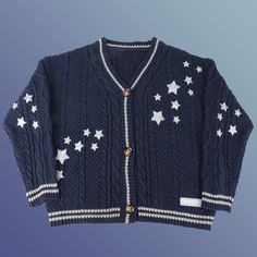 a blue sweater with white stars on it