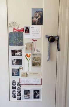 a white refrigerator covered in magnets and pictures