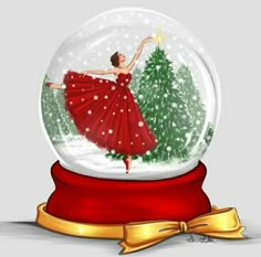 a snow globe with a ballerina in it