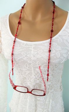 Red beaded Eyeglass Chain, and Necklace combination handmade by Ralston Originals. This is a unique original style Eyeglass Chain and Necklace combination designed by Ralston Originals. Unique from any other Eyeglass Chains on Etsy, Ralston Originals was the first to add the lobster clasp at the end of the chain to join together to make a Necklace. Brilliant! This makes it even more unique because you now have two great pieces of jewelry in one!! Wear it to work or shopping as a Necklace, then w Beaded Eyeglass Chain, Eyeglass Chains, Eyeglasses Chain, Red Eyeglasses, Make A Necklace, Eyeglass Necklace, Glasses Chains, Eyeglass Holder, Eyeglass Chain