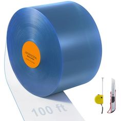 a roll of blue tape sitting on top of a white board