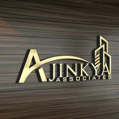 the logo for junka associates, which is located in front of a wooden wall