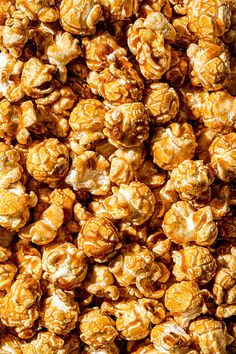 a pile of caramel popcorn sitting on top of a table