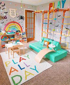 a child's playroom with toys and decorations on the walls, carpeted flooring