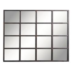 a mirror that is on the wall with many squares in it and one has been made out of metal