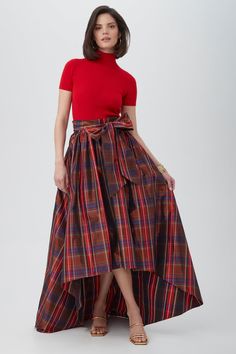 Featuring a high-low hem, sash tie belt, and A-line silhouette, this bold plaid maxi skirt is a statement piece. Perfect for pairing with a blouse or sweater for a standout look. Banded waist Sash tie belt Side zipper Side slit pockets A-line skirt High-low hem Runs true to size Model is 5'10", wearing size 2 See Women's Size Guide FABRIC: Playful Plaid Taffeta 100% Polyester Dry clean only Fabric from Italy Shop all Playful Plaid Taffeta Plaid Maxi Skirt, High Low Skirt, Mock Neck Top, Slim Fit Shorts, Groom Dress, Fall Shopping, Elbow Length Sleeve, Trina Turk, Short Sleeved Sweaters