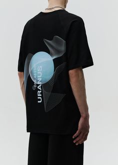 Oversized unisex t-shirt. Features a unique print in URANUS edition. Made with high quality materials. Material: 95% cotton, 5% elastane Model wears: L sizeModels height: 187 cm Modern Oversized Black T-shirt, Modern Black Tops With Graphic Design, Black T-shirt With Sublimation Print, Relaxed Fit, Modern Black Tops With Screen Print, Modern Black Top With Screen Print, Black Man, Short Leggings, Unique Print, Shirt Print