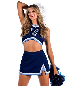 a woman in a cheerleader outfit posing for the camera