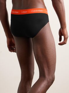 Calvin Klein Underwear's briefs are ideal if you prefer minimal coverage. Each pair in this pack of three is cut from soft, breathable stretch-cotton and has a signature elasticated waistband in a different colour. Cotton Briefs With Logo Waistband, Stretch Briefs With Logo Waistband, Cotton Sports Briefs, Stretch Boxer Briefs With Logo Waistband For Loungewear, Multi-pack Cotton Sports Bottoms, Black Cotton Bottoms Multi-pack, Tom Ford Bag, Wardrobe Edit, Luxury Sneakers