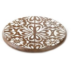 a brown and white plate sitting on top of a table