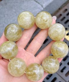 Material:Citrine Quartz beads size :Approx 27mm   quantity: one strand  6mm approx 29 pcs one strands 7mm approx25 pcs one strands 8mm approx 22 pcs one strands 9mm approx 21pcs one strands 10mm approx 19 pcs one strands 11mm approx 18pcs one strands 12mm approx 16 pcs one strands 13mm approx 16 pcs one strands 14mm approx 15 pcs one strands 15mm approx 14pcs one strands 16mm approx 14 pcs one strands 17mm approx 13pcs one strands 18mm approx 13pcs one strands 19mm approx 12pcs one strands 20mm Yellow Gemstone Beads Crystal Bracelet, Citrine Gemstone Beads Crystal Bracelet, Yellow Crystal Healing Bracelet With Round Beads, Natural Stone Citrine Beaded Bracelets, Citrine Natural Stones Beaded Bracelets, Citrine Beaded Bracelets With Natural Stones, Citrine Gemstone Beaded Bracelets, Yellow Crystal Bracelet With Round Beads For Healing, Large Beads