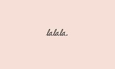 the word lada written in black ink on a pink background