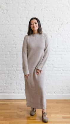 The Tana Maxi Dress is a classic, fully length sweater dress that will keep you warm on chillier days! This dress is a cool light brown knit and features a split bottom hem, making it super easy to move around in. You can pair this dress with a belt and pair of boots to wear out to dinner, to the office, or to a holiday party. We can't wait to see you in the Tana Dress. Fit: Intentionally oversized Fabric: 65% Acrylic, 15% Wool, 20% Nylon Care: Hand wash cold, lay flat to dry