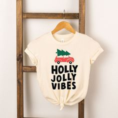 Looking for a cute tee for your kids? We have the perfect Holly Jolly Vibes Car graphic tee addition to their closet! Car Graphic Tee, Holly Jolly Vibes, Toddler Christmas Shirt, Toddler Graphic Tee, Happy Labor Day, Toddler Christmas, Online Clothing Boutiques, Cool Graphic Tees, Fashion Inspiration Design